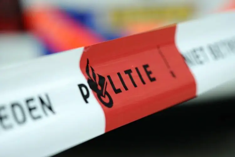 Persoon overleden in woning; bewoner aangehouden